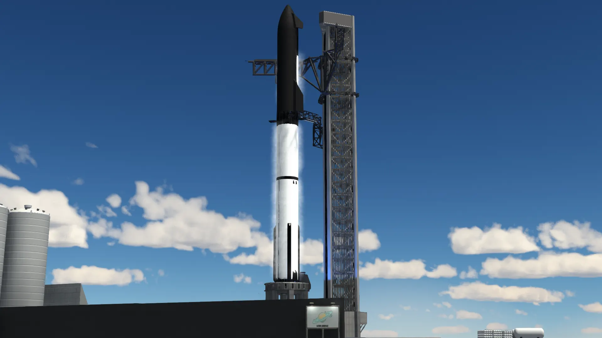 Rhea stacked on the launch mount beside the tower